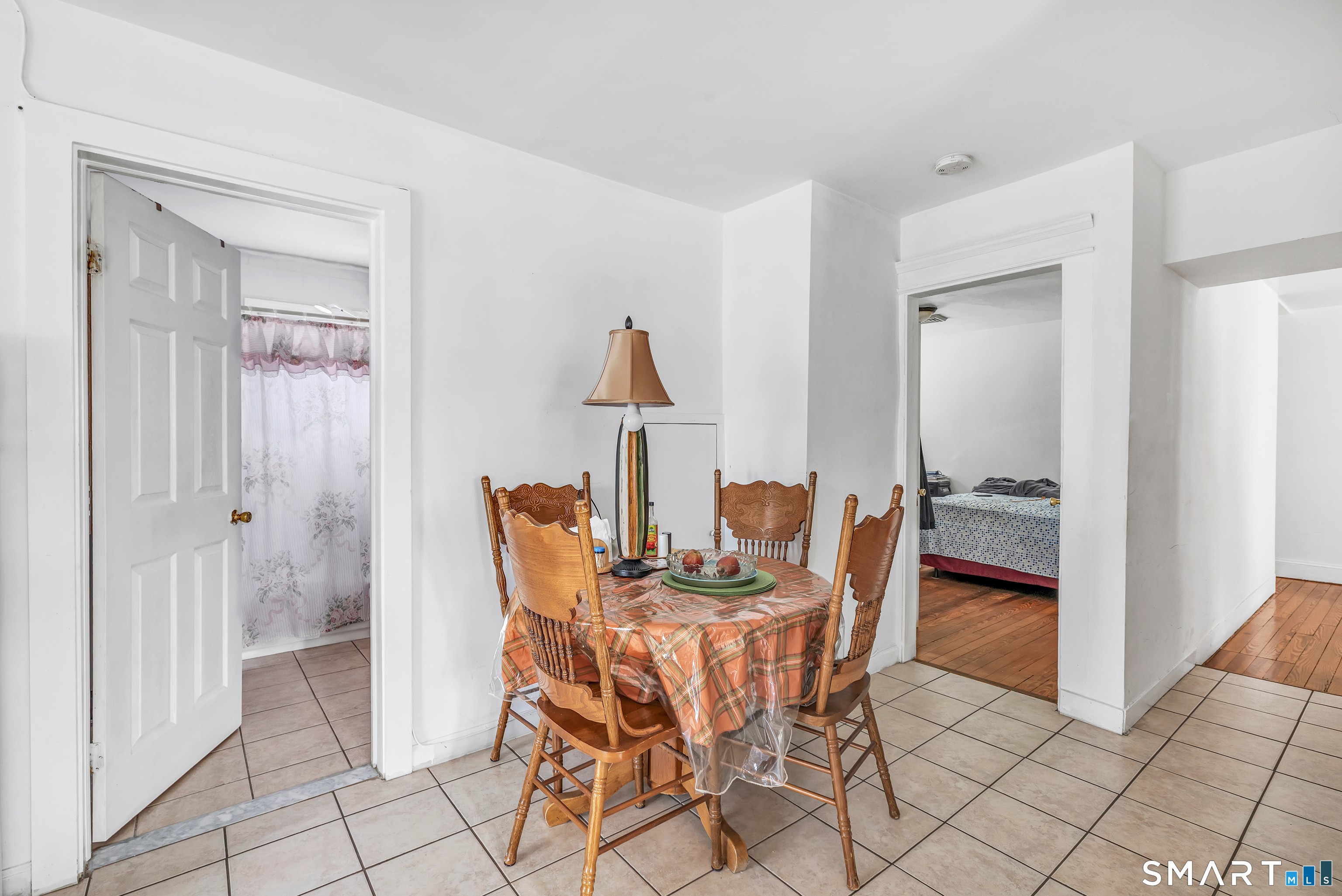 189 Wells Street Bridgeport, CT 06606 - Photo 29 of 40 3rd Floor Offers 946 sq ft -Electric stove, fridge, laundry room with washer/dryer
