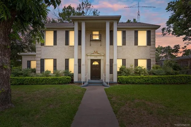a front view of a house having yard