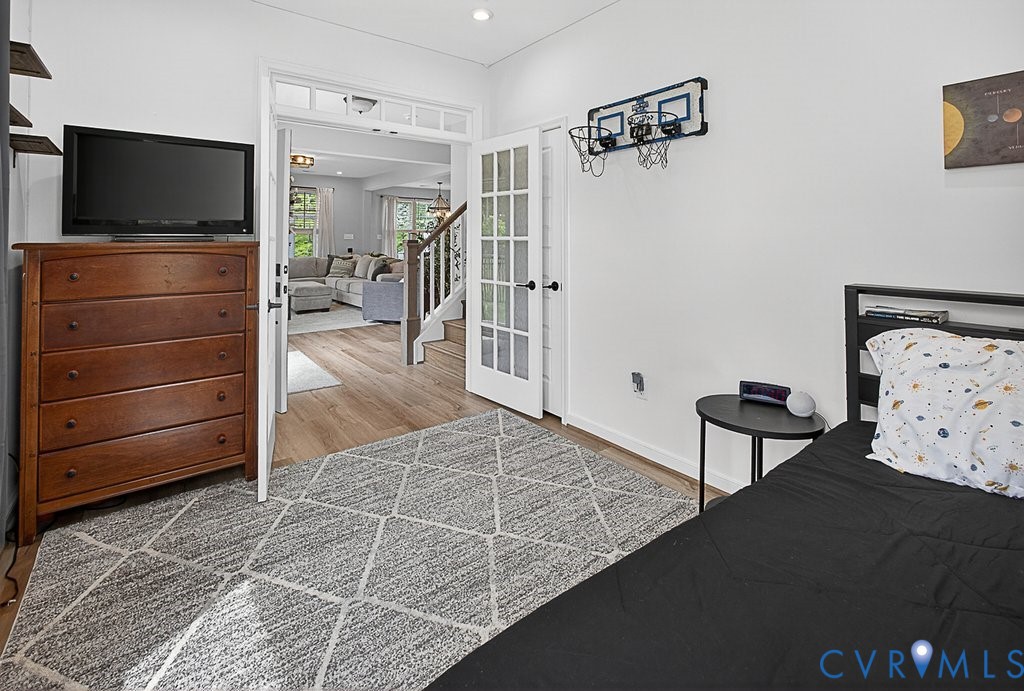 18517 Palisades Ridge Moseley, VA 23120 - Photo 14 of 55 a living room with furniture and a flat screen tv