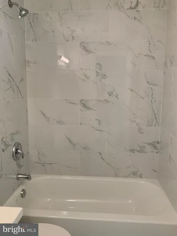 a bathroom with a sink a toilet and vanity