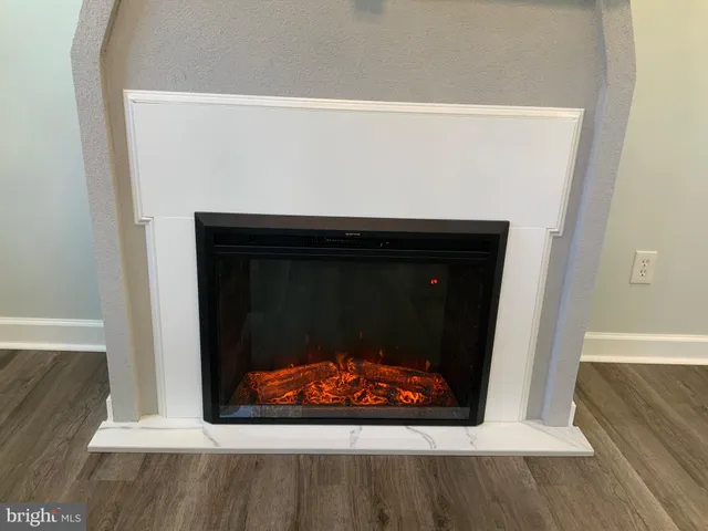 a living room with a fireplace