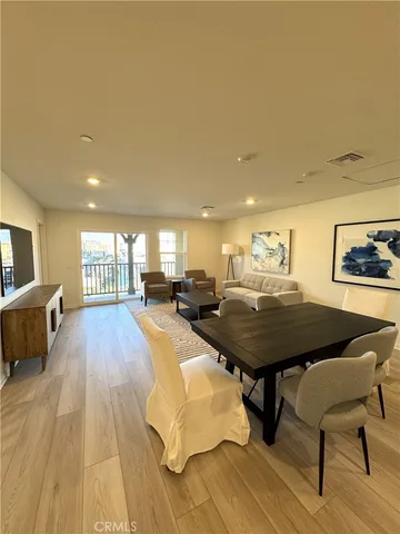 a living room with a couch and a table