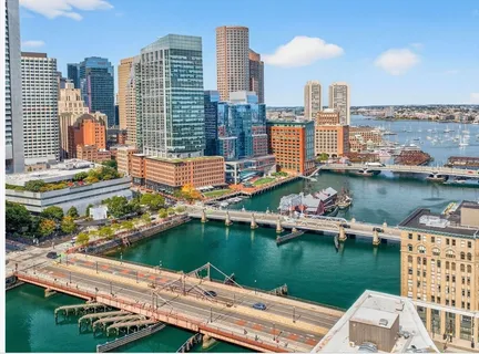 a view of a city with tall buildings