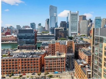 a view of city with tall buildings