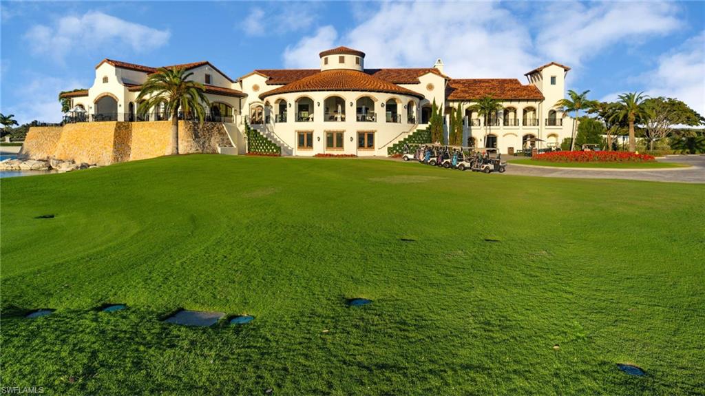 16351 Viansa Way, Unit 202 Naples, FL 34110 - Photo 26 of 35 Surrounding community with stairway and a balcony