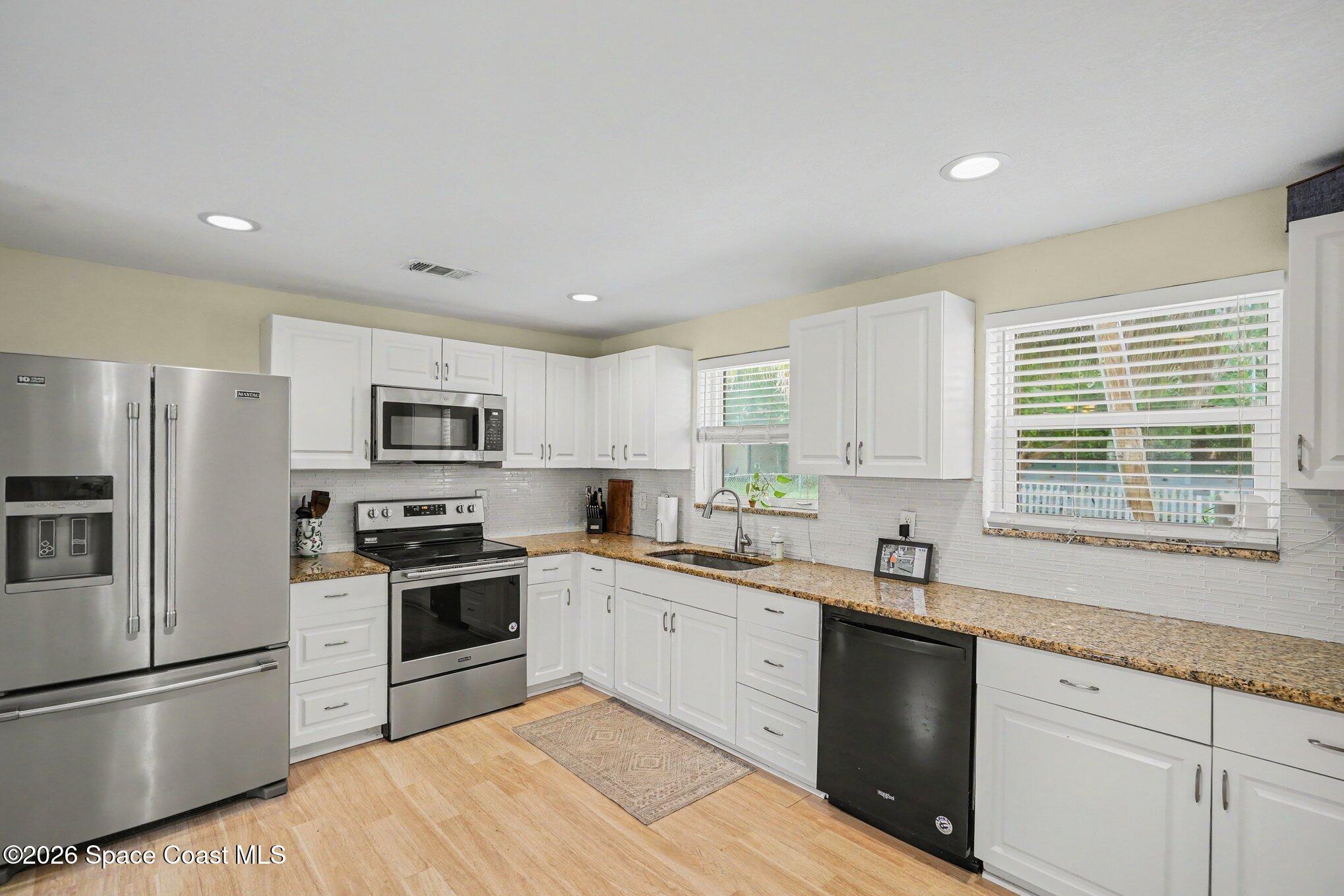 2556 1st Avenue Northeast Palm Bay, FL 32905 - Photo 7 of 27 009_file_3339