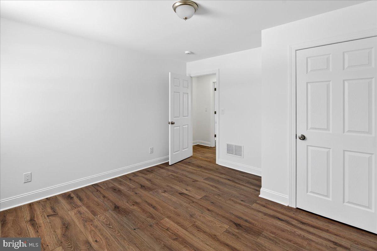 464 Sykesville Road Wrightstown, NJ 08562 - Photo 25 of 32 a view of an empty room with wooden floor