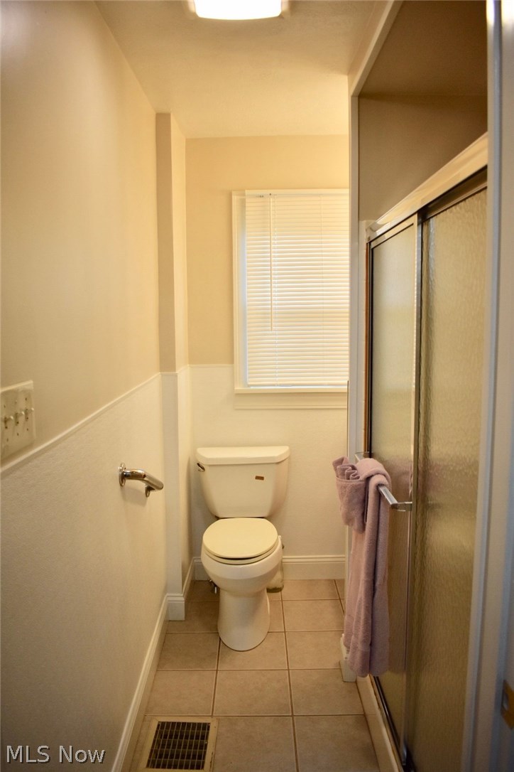 1246 Deforest Road Southeast Warren, OH 44484 - Photo 18 of 26 The bathroom measures 7x5. Includes a stand-up shower and disability features.