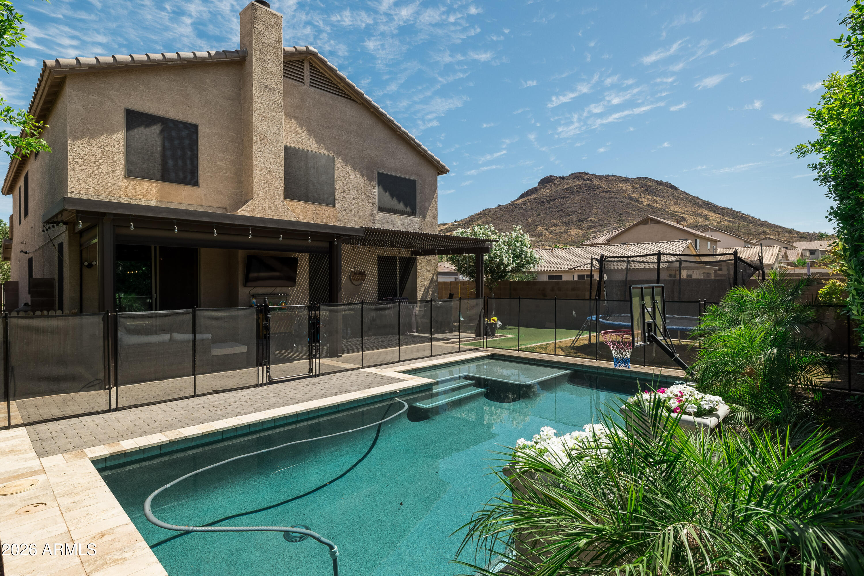 6407 West Saddlehorn Road Phoenix, AZ 85083 - Photo 12 of 41 a view of a house with pool and chairs