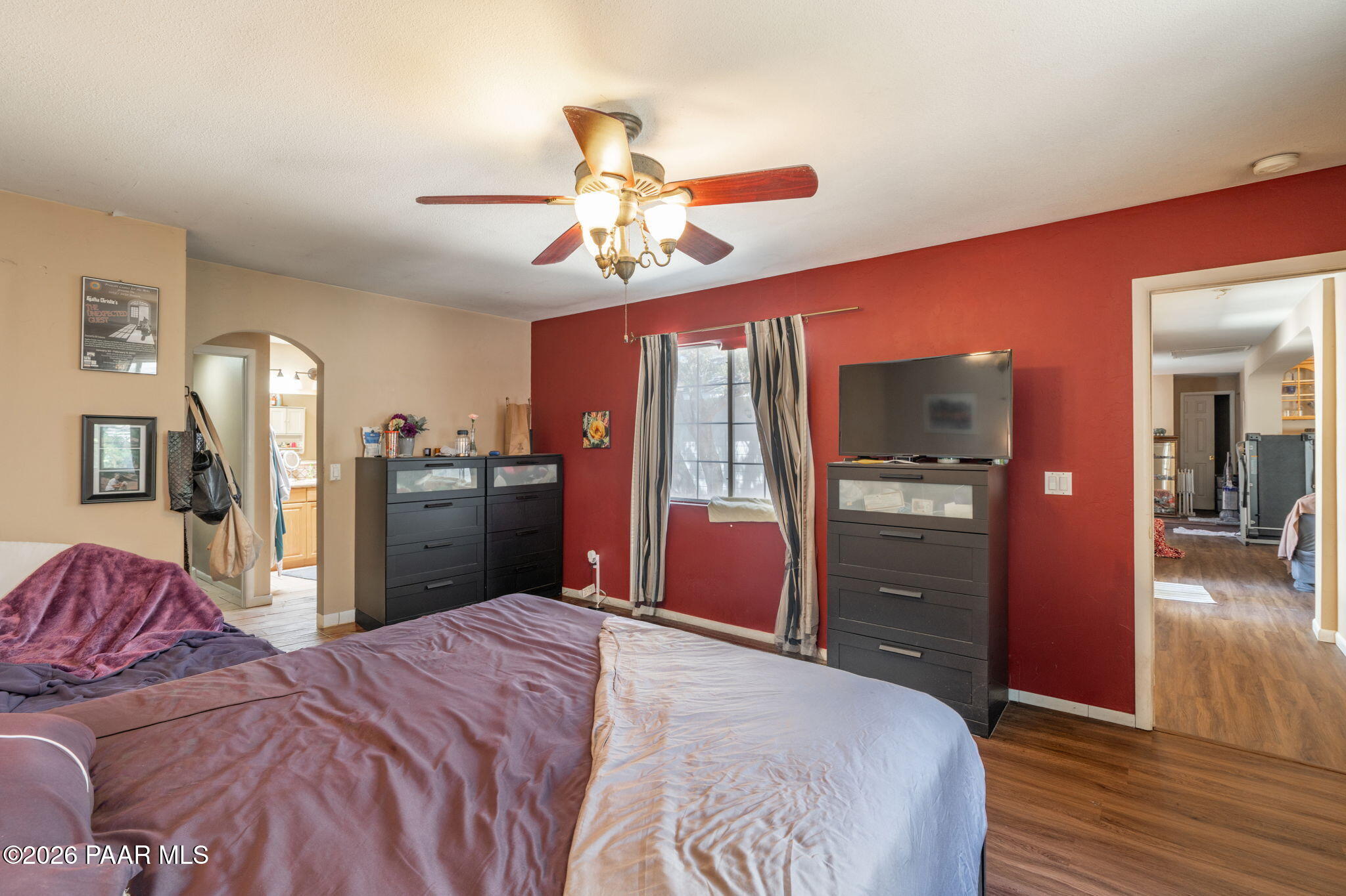 1710 Grandview Road Prescott, AZ 86305 - Photo 15 of 47 a bedroom with a bed and wooden floor