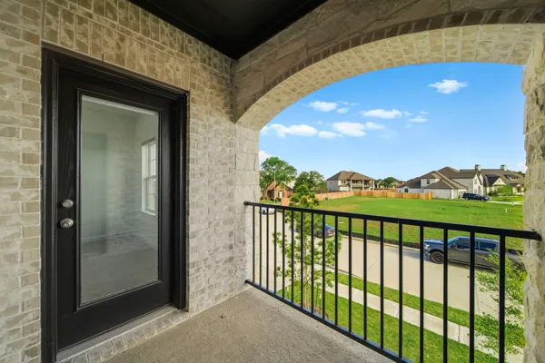 a view of a balcony with an outdoor space