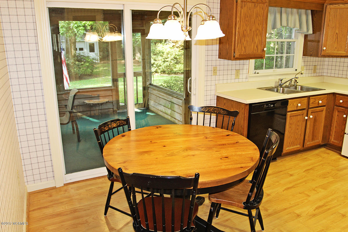104 Olga Road Beaufort, NC 28516 - Photo 15 of 40 Breakfast room to porch