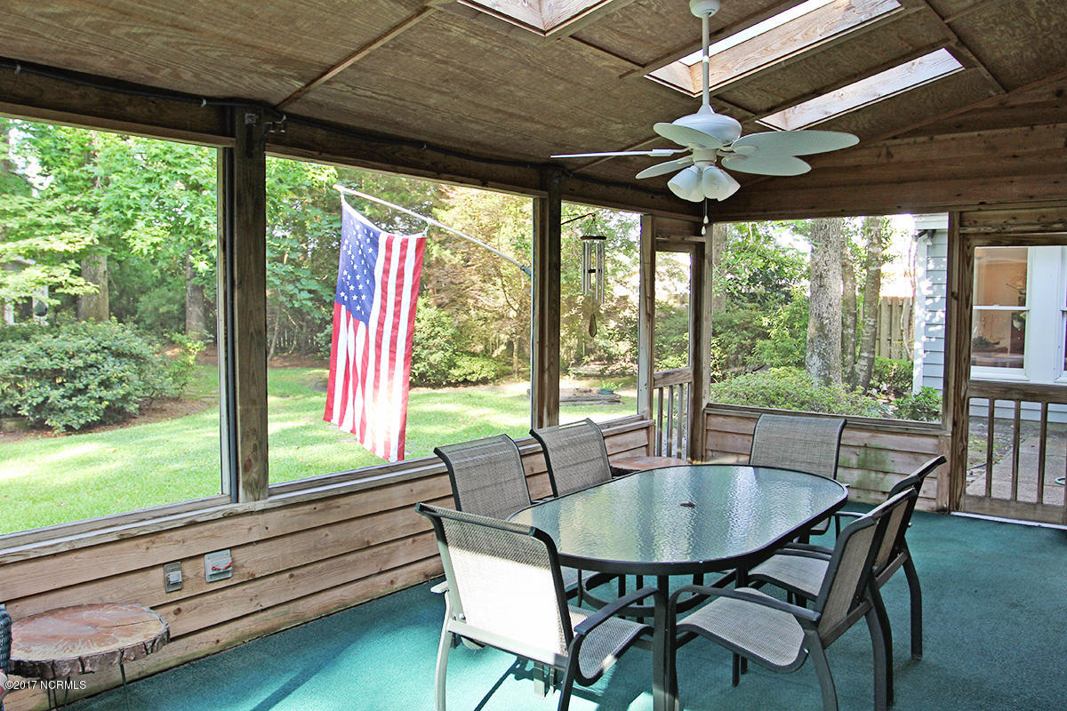 104 Olga Road Beaufort, NC 28516 - Photo 29 of 40 Screened porch to fenced backyard