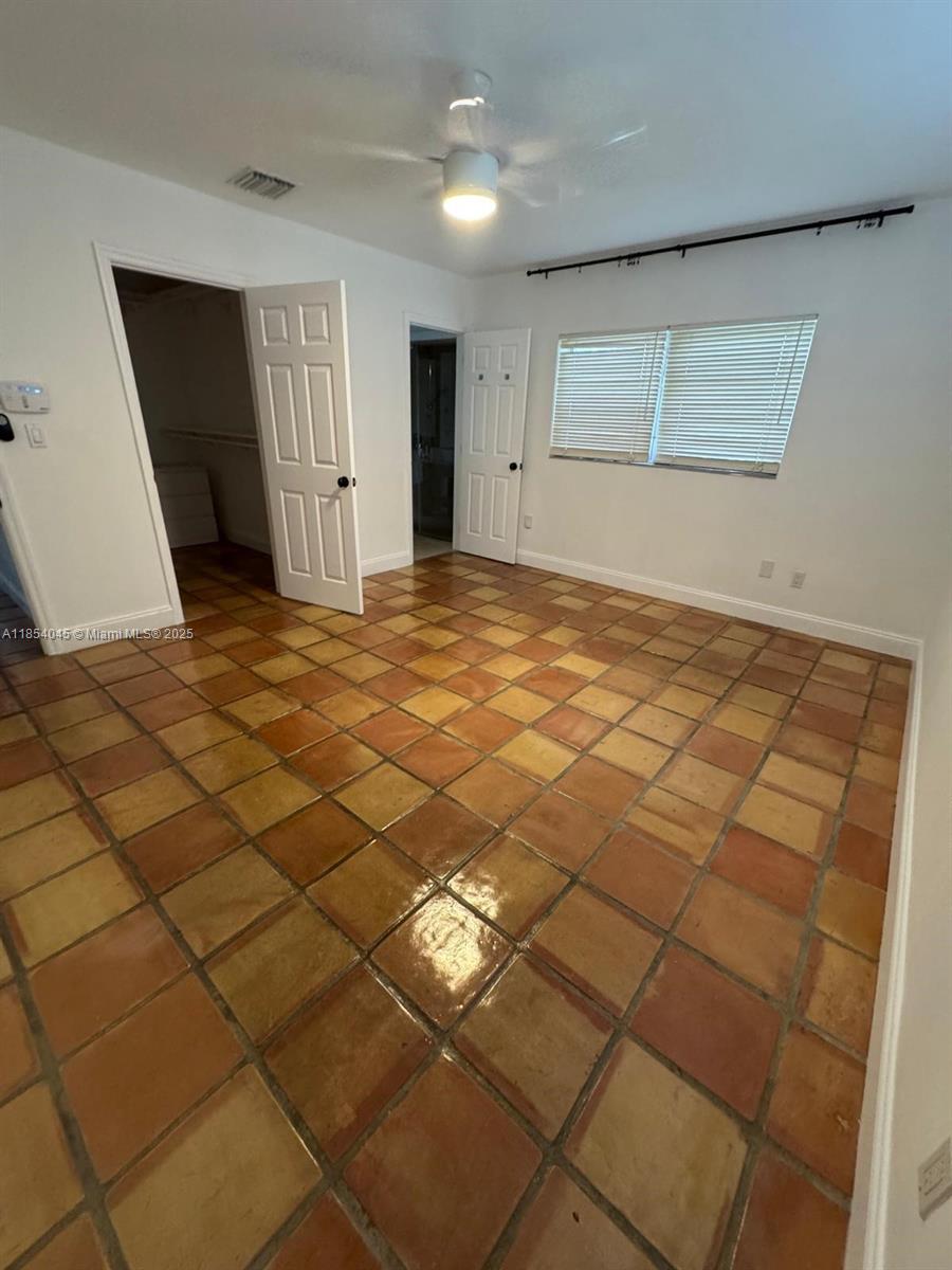 5801 Southwest 100th Street, Unit 1 Pinecrest, FL 33156 - Photo 5 of 11 a view of empty room