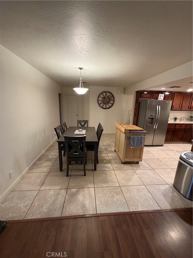 209 Kimberly Lane Ridgecrest, CA 93555 - Photo 25 of 62 a living room with furniture and a rug