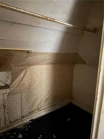 a kitchen with a sink and a refrigerator