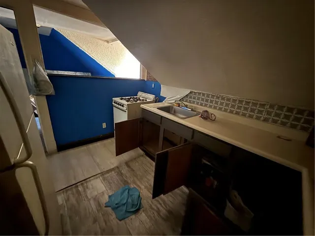 a view of a back yard of the house