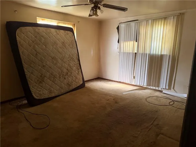 a view of a livingroom with furniture