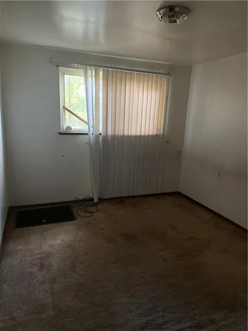 a view of a livingroom with window