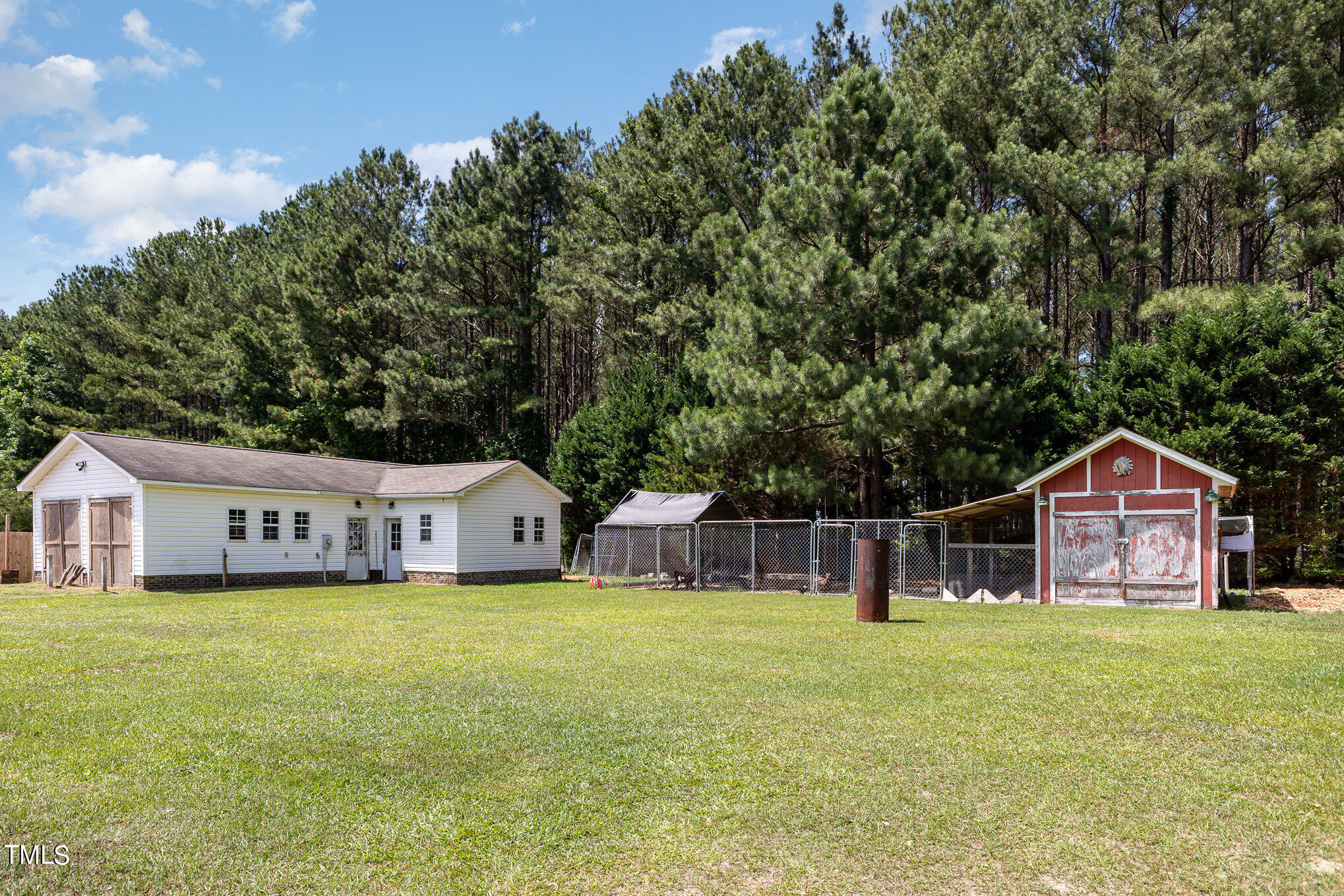 112 Forest Ridge Drive Willow Spring, NC 27592 - Photo 18 of 21 a house view with a outdoor space