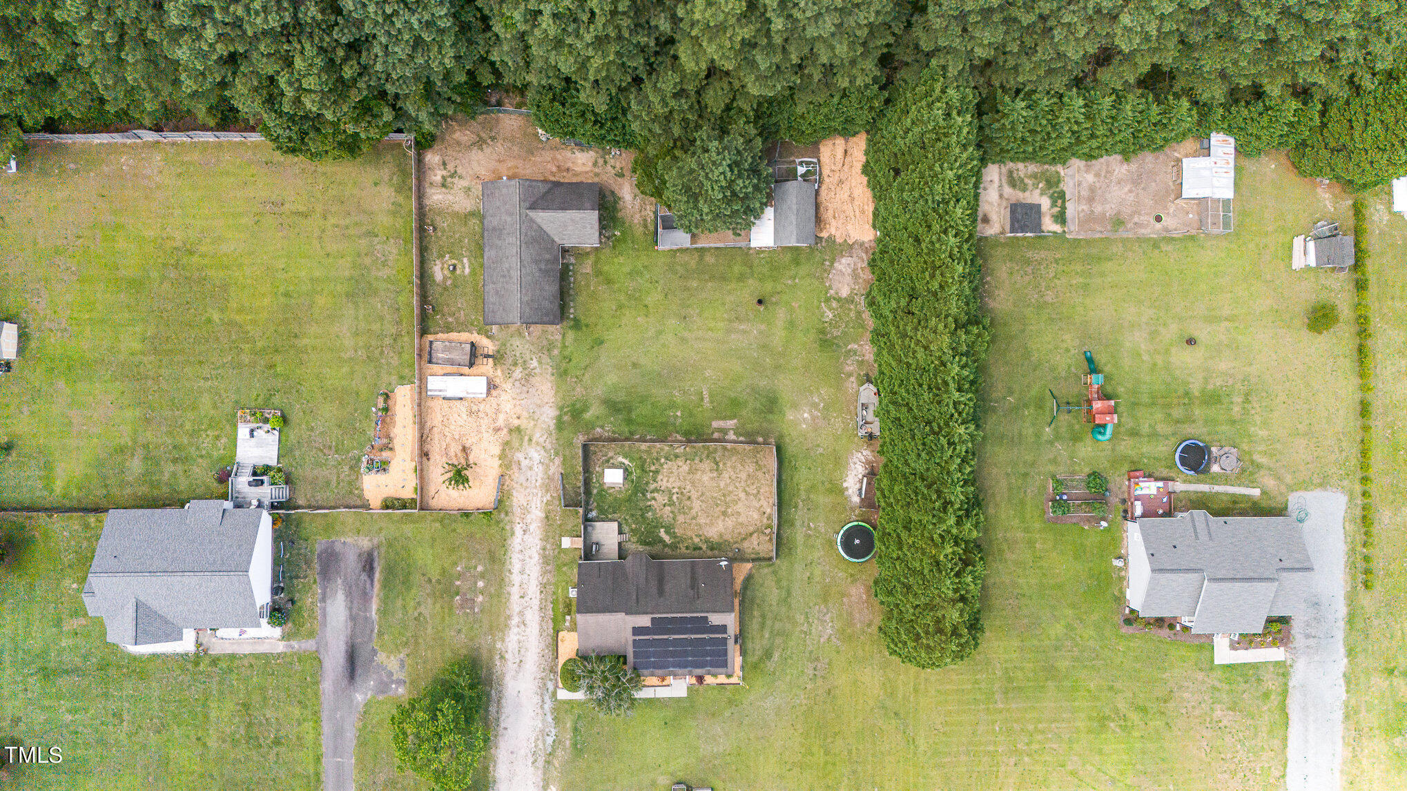 112 Forest Ridge Drive Willow Spring, NC 27592 - Photo 19 of 21 aerial view of a residential apartment building with a yard