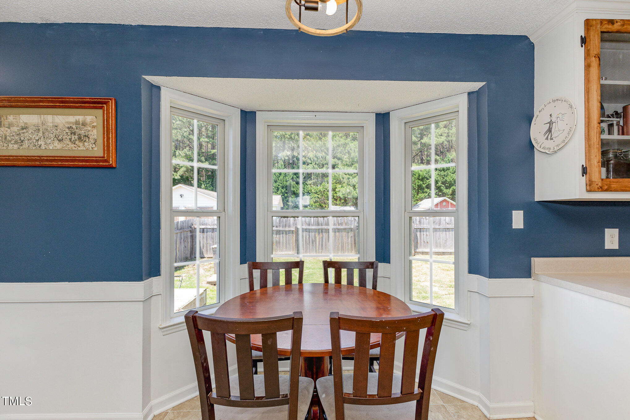 112 Forest Ridge Drive Willow Spring, NC 27592 - Photo 7 of 21 a view of a dining room with furniture window and outside view