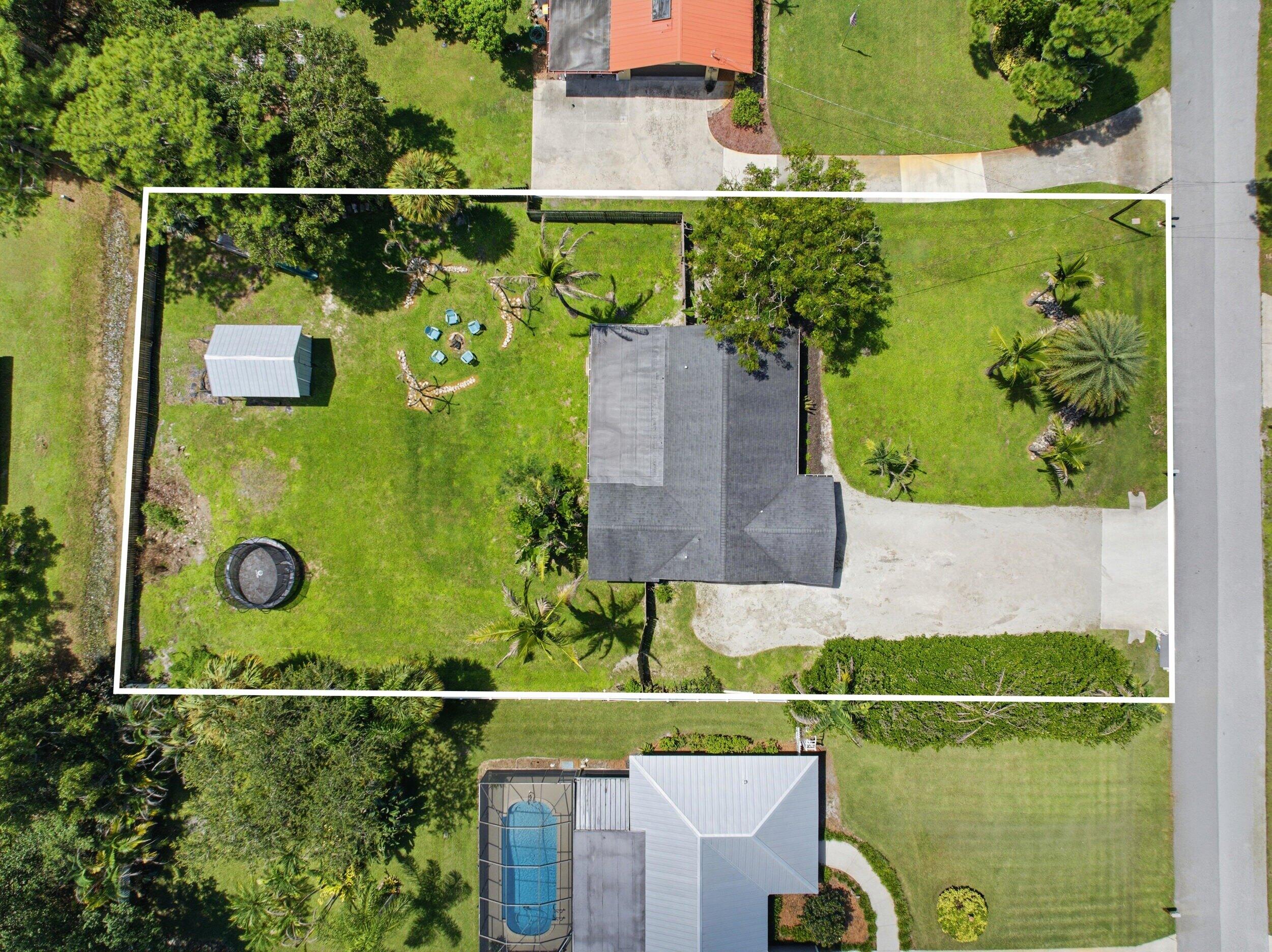 1710 Southwest Wildcat Trail Stuart, FL 34997 - Photo 30 of 34 39_dji_20260906092236_0922_d_1