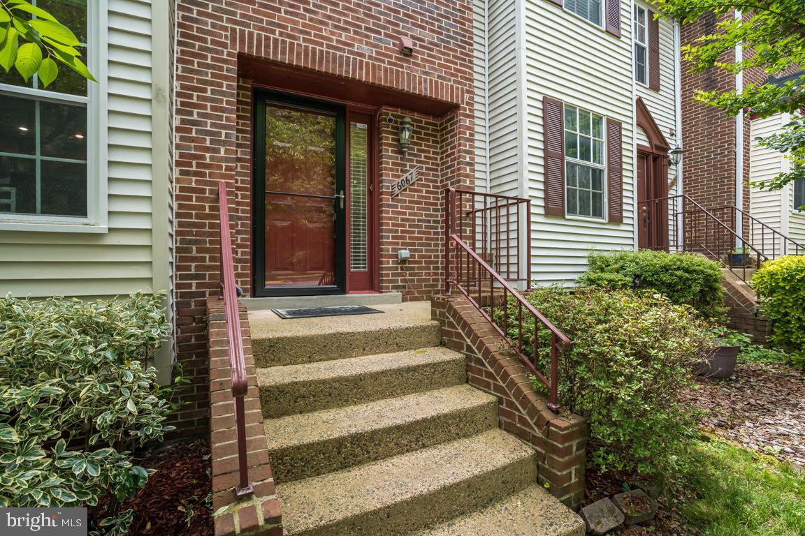 6067 Knights Ridge Way Alexandria, VA 22310 - Photo 2 of 39 a view of a house with a window and stairs
