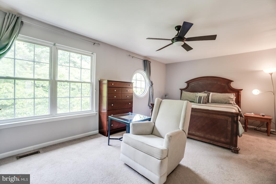 6067 Knights Ridge Way Alexandria, VA 22310 - Photo 24 of 39 a living room with furniture and a window