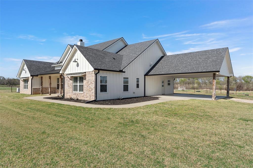 399 Satin Road Chilton, TX 76632 - Photo 2 of 34 a view of a house with backyard and garden