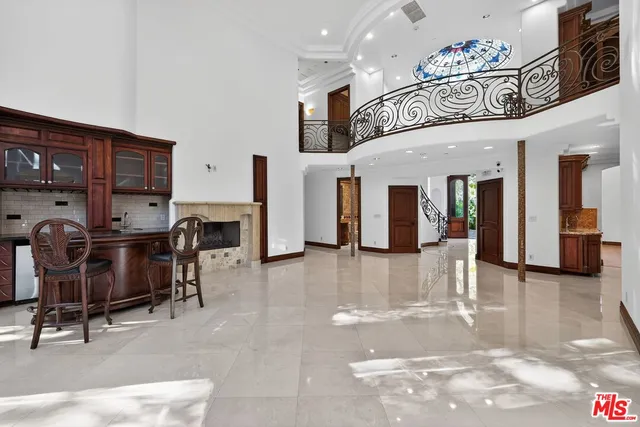 a view of a livingroom with furniture and furniture