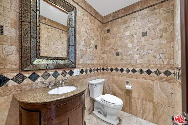 a bathroom with a sink and a toilet