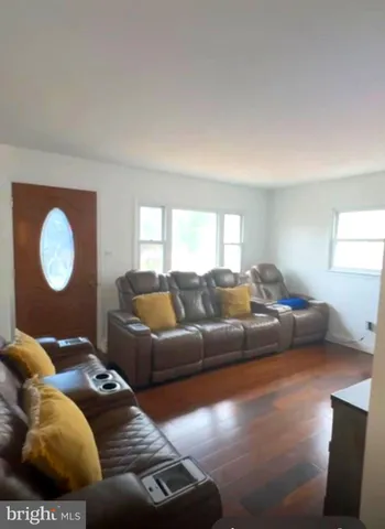 a bedroom with a bed and flat screen tv