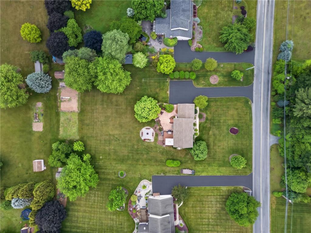 853 Lahr Road Nazareth, PA 18064 - Photo 29 of 29 An aerial perspective reveals sprawling green lawns, mature trees, and private driveways connecting to a quiet street.