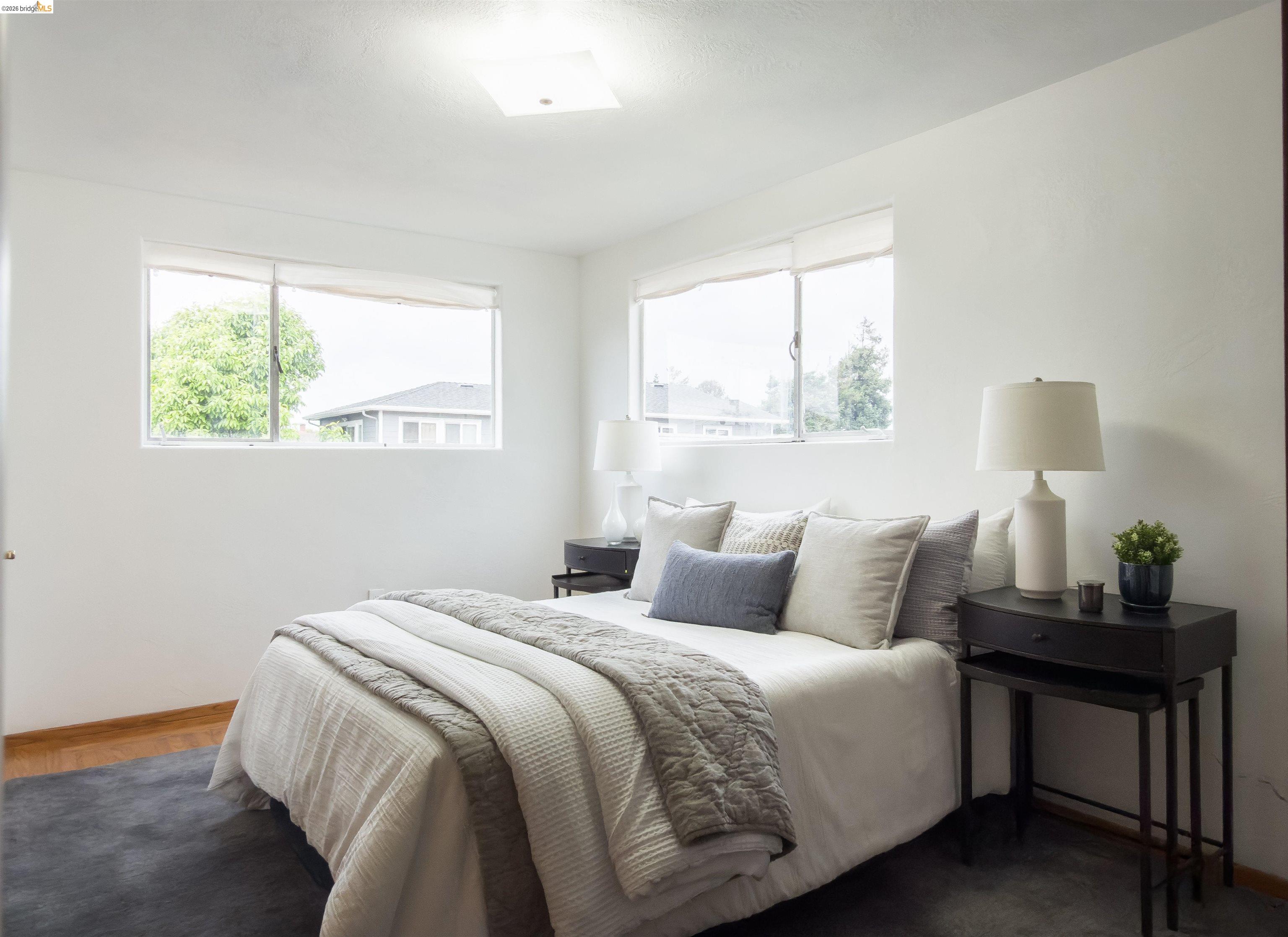 910 Pierce Street Albany, CA 94706 - Photo 11 of 44 a bedroom with bed and a window