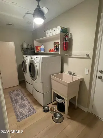 a utility room with dryer and washer