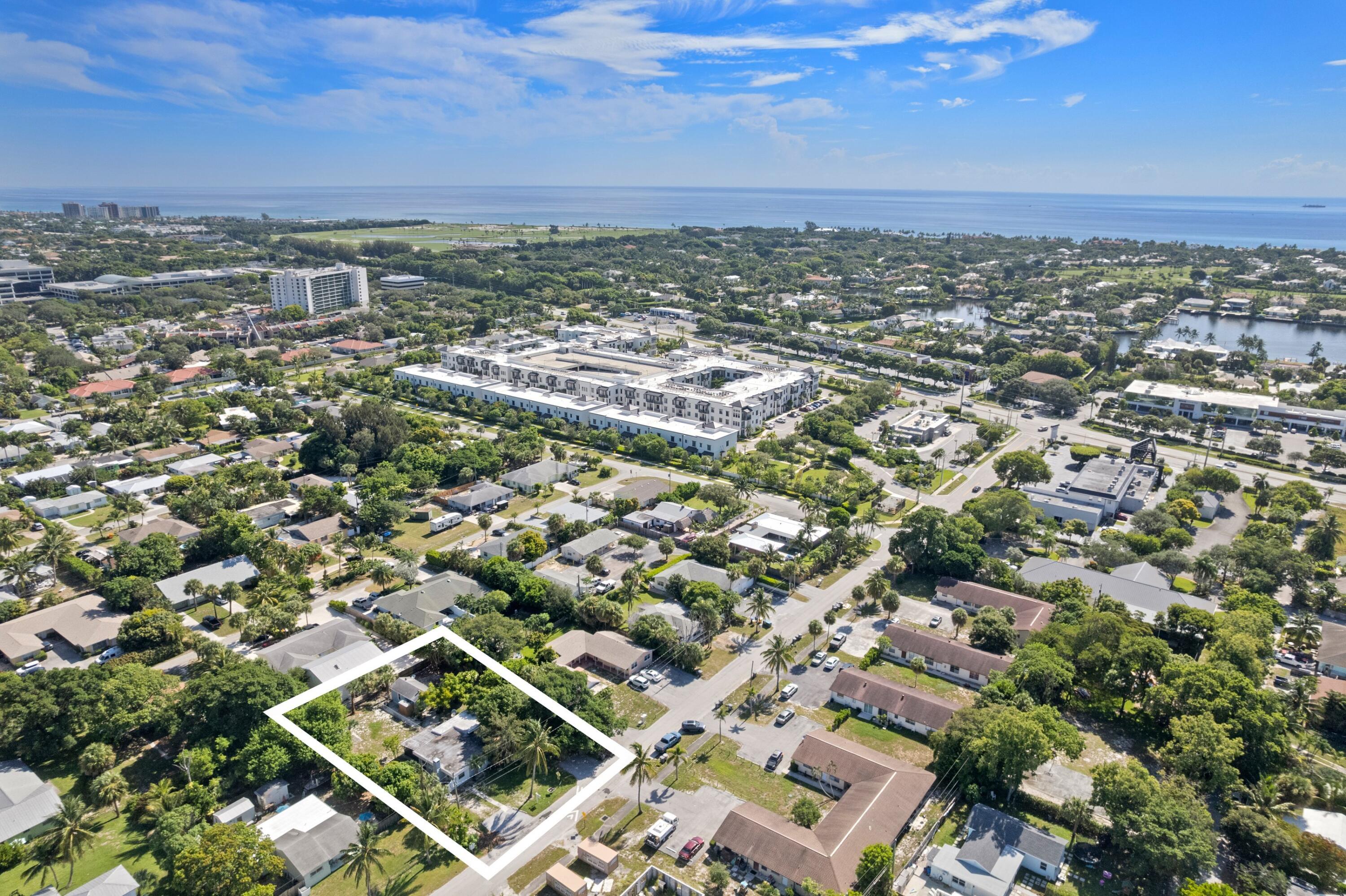 1831 Juno Road North Palm Beach, FL 33408 - Photo 8 of 37 an aerial view of multiple house