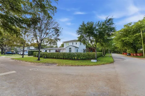 a house with trees in front of it