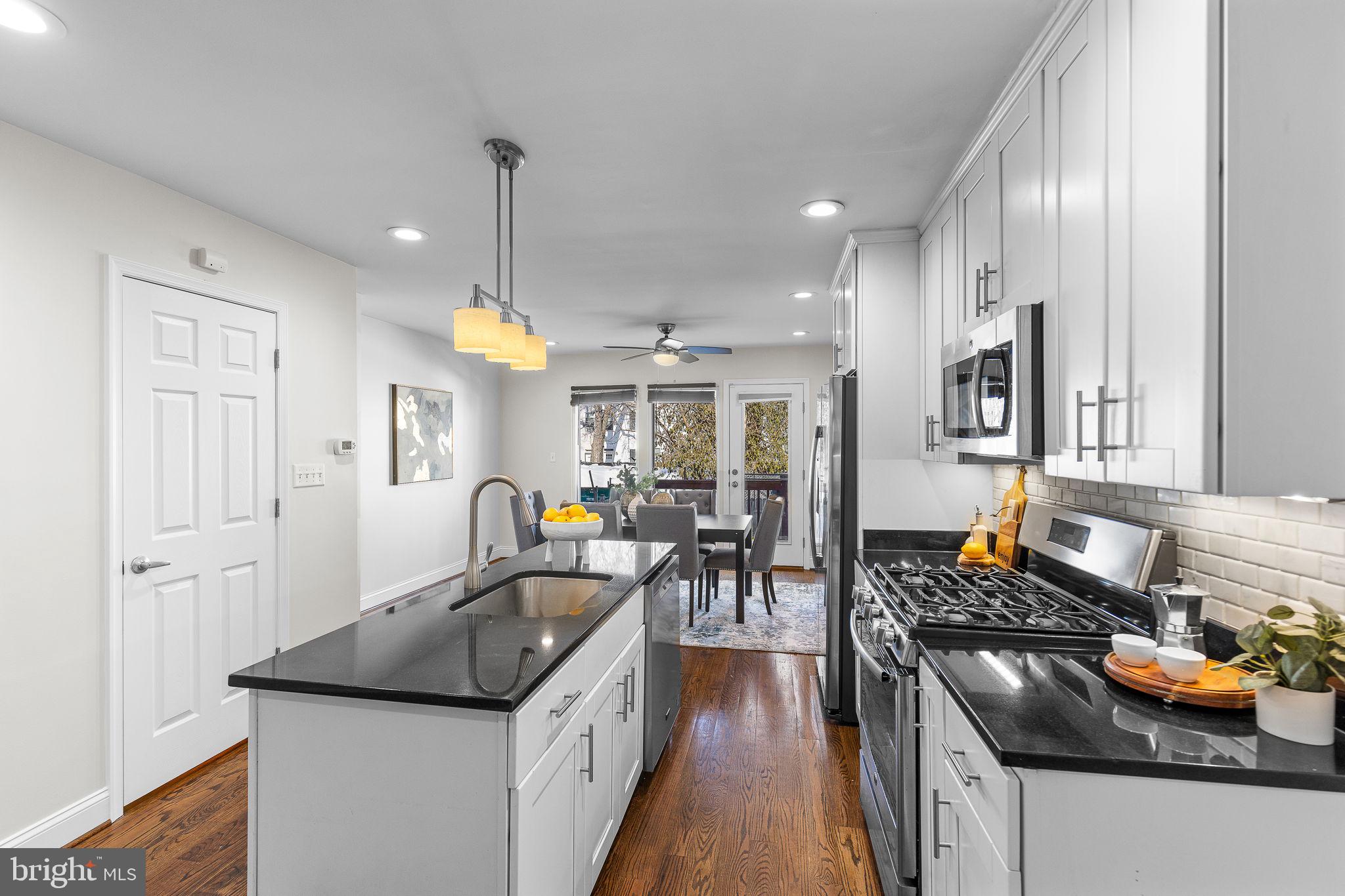 1638 Rosedale Street Northeast Washington, DC 20002 - Photo 11 of 37 Open kitchen - island, granite & stainless steel