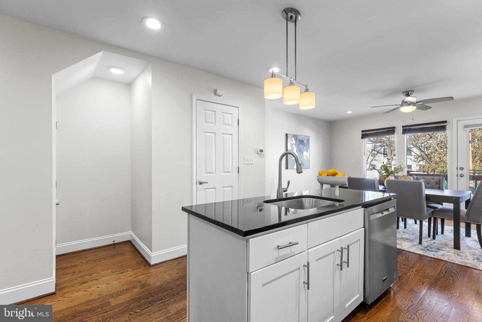 1638 Rosedale Street Northeast Washington, DC 20002 - Photo 12 of 37 Open kitchen - island, granite & stainless steel