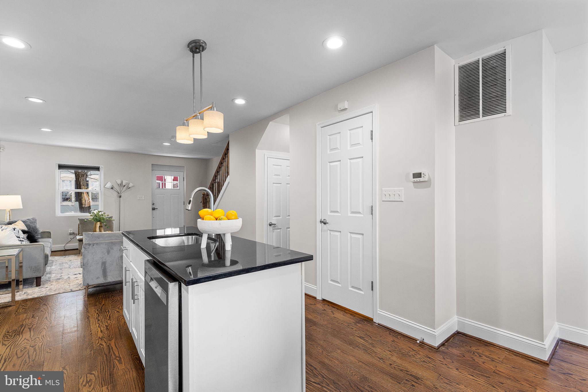 1638 Rosedale Street Northeast Washington, DC 20002 - Photo 13 of 37 Open kitchen - island, granite & stainless steel