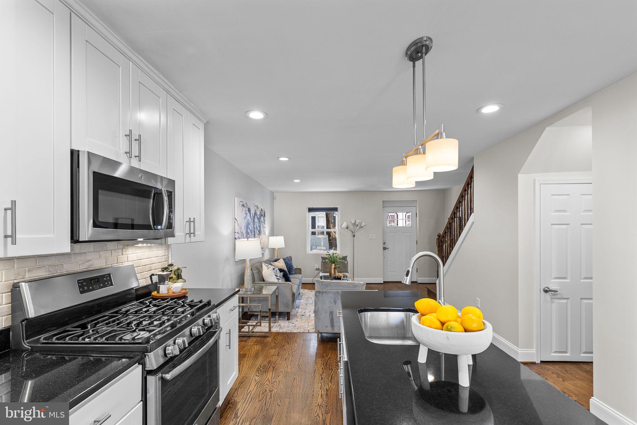 1638 Rosedale Street Northeast Washington, DC 20002 - Photo 14 of 37 Open kitchen - island, granite & stainless steel