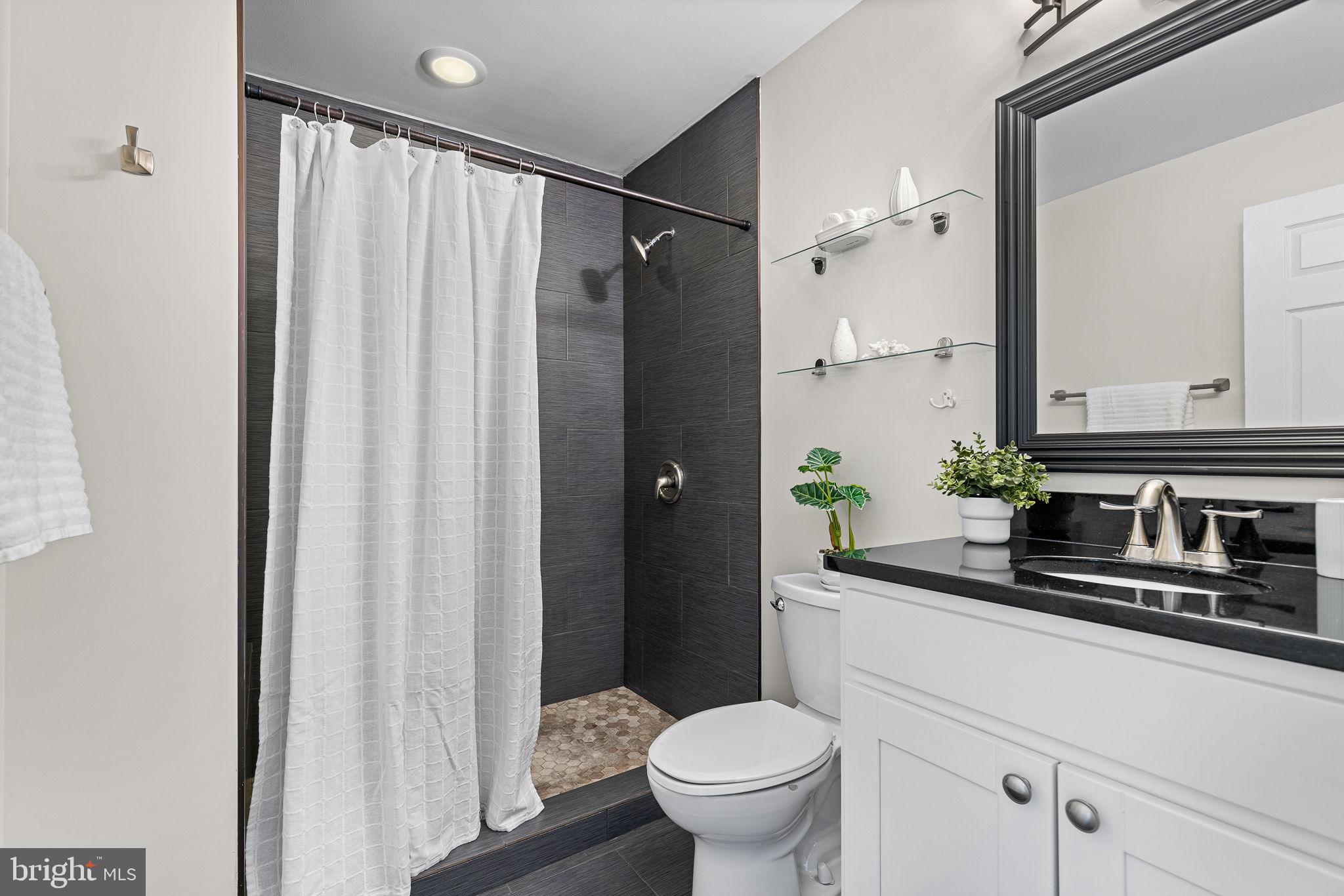 1638 Rosedale Street Northeast Washington, DC 20002 - Photo 21 of 37 Renovated Primary Bath