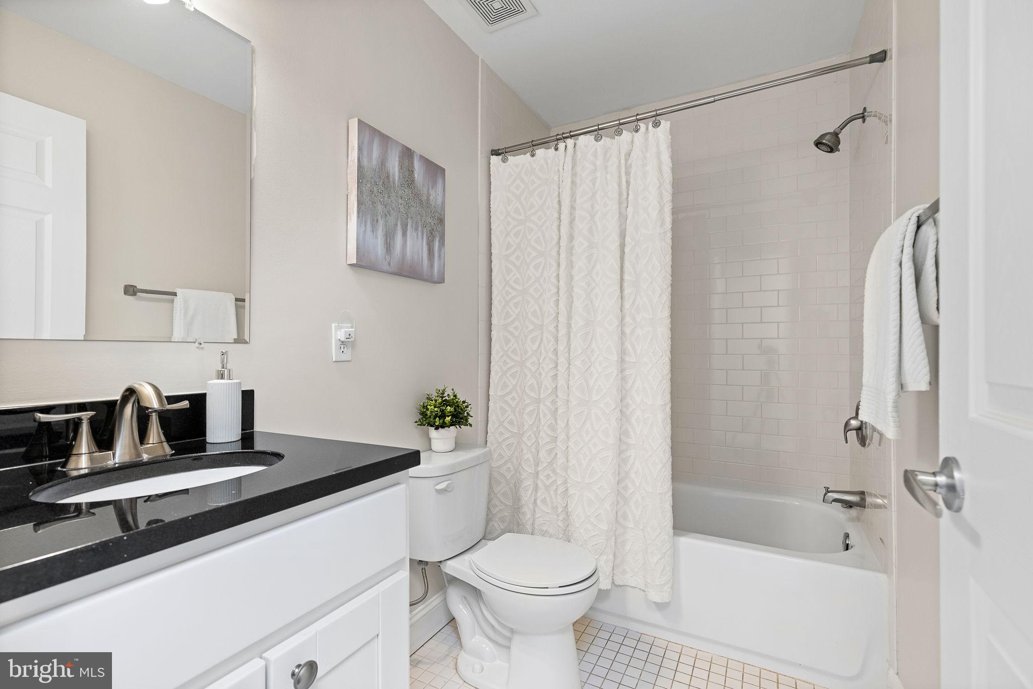 1638 Rosedale Street Northeast Washington, DC 20002 - Photo 25 of 37 Upper level renovated hall bath