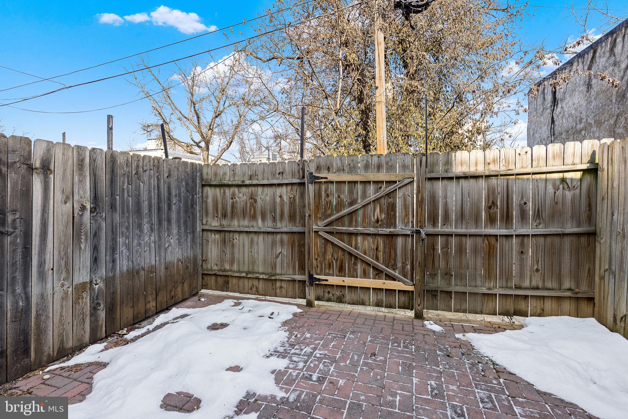1638 Rosedale Street Northeast Washington, DC 20002 - Photo 33 of 37 Private backyard with brick patio!