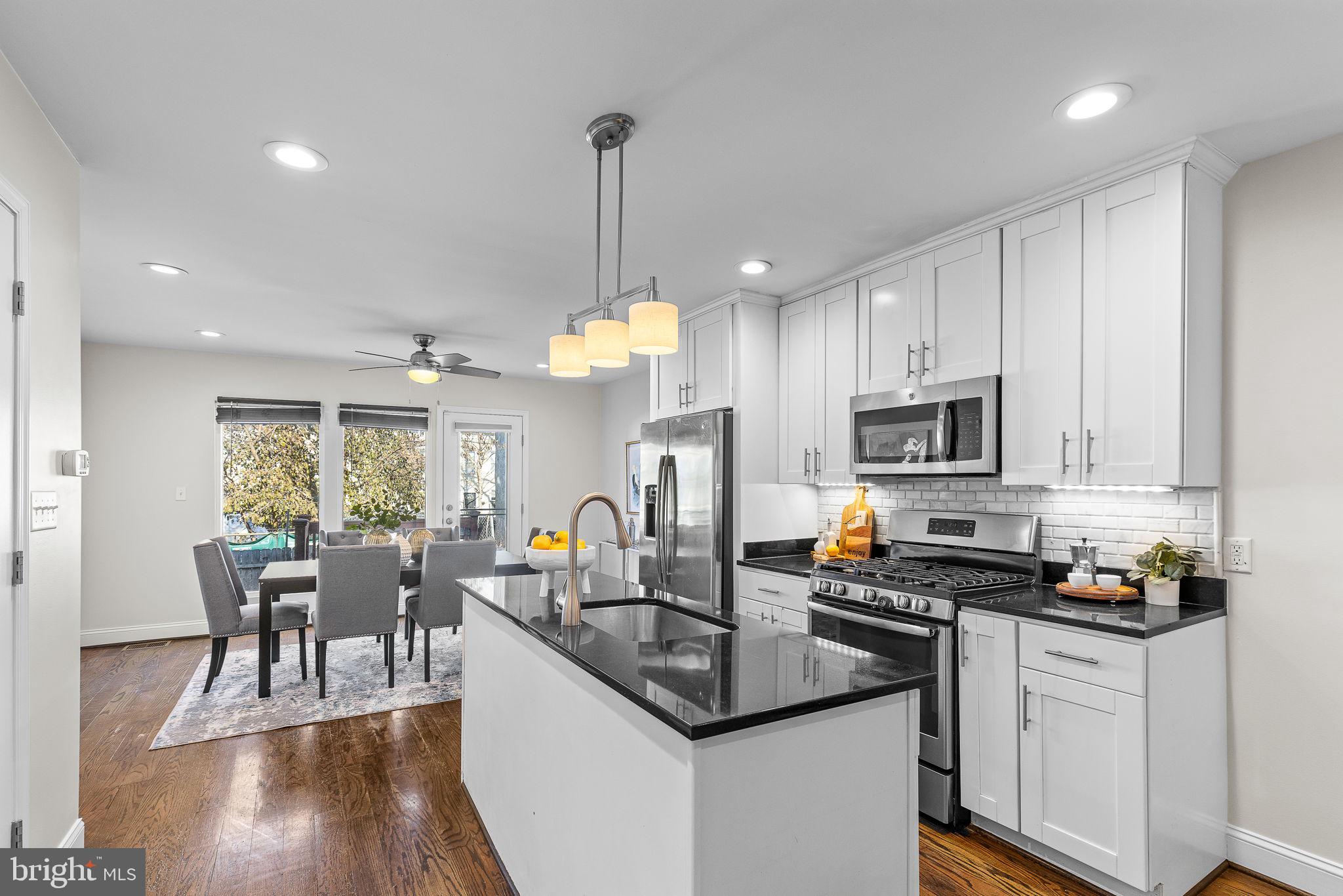 1638 Rosedale Street Northeast Washington, DC 20002 - Photo 10 of 37 Open kitchen - island, granite & stainless steel