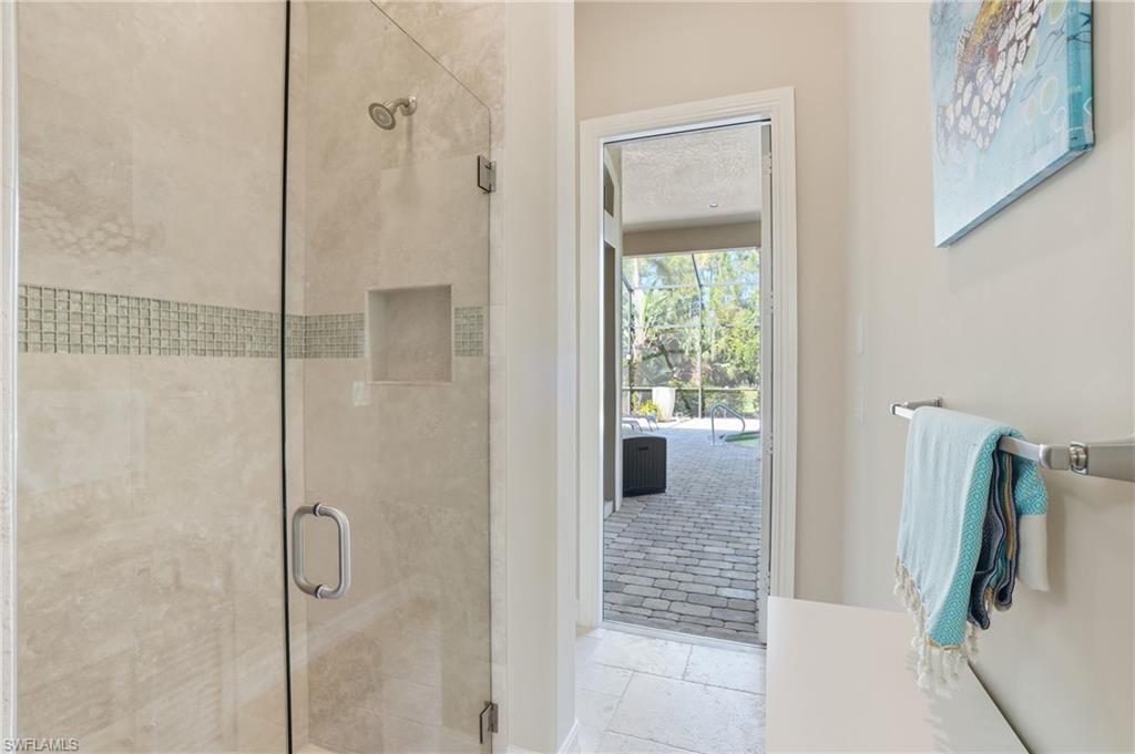 6453 Costa Circle Naples, FL 34113 - Photo 28 of 47 Guest and Cabana Pool with Linen Closet