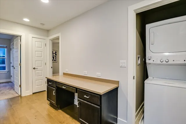 a view of storage and utility room with washer and dryer