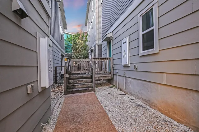a view of stairs and wooden floor