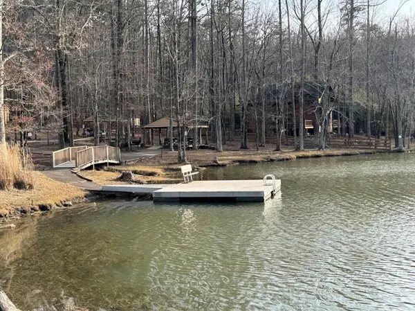 a view of a lake with trees